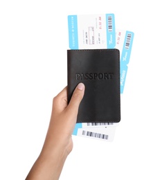 Woman holding passport with tickets on white background, closeup. Travel agency concept