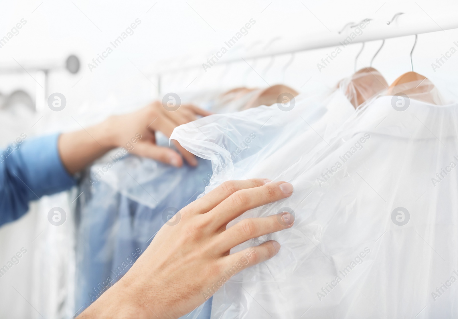 Photo of Employee working at dry-cleaner's