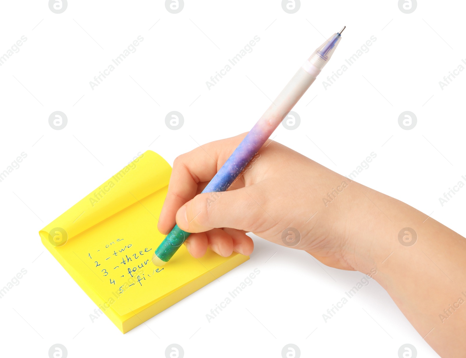 Photo of Child erasing word Five written with erasable pen on sticky note against white background, closeup