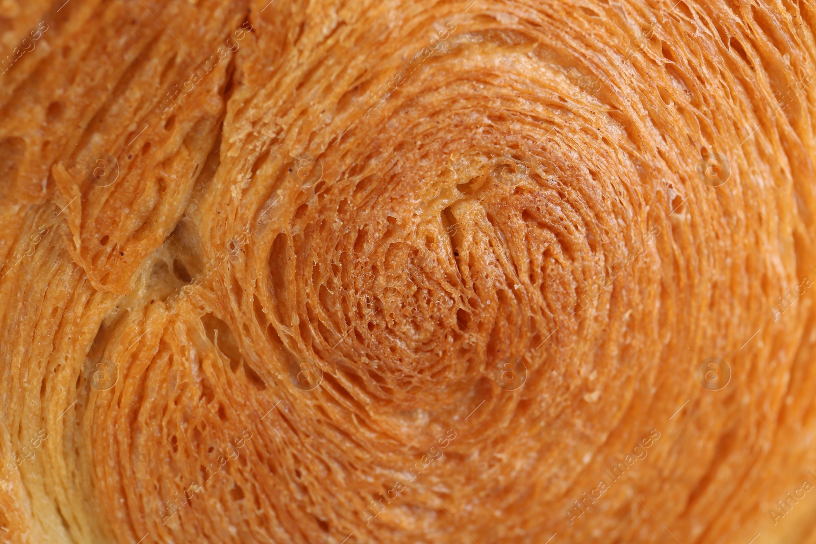 Photo of Tasty puff pastry. Supreme croissant as background, closeup