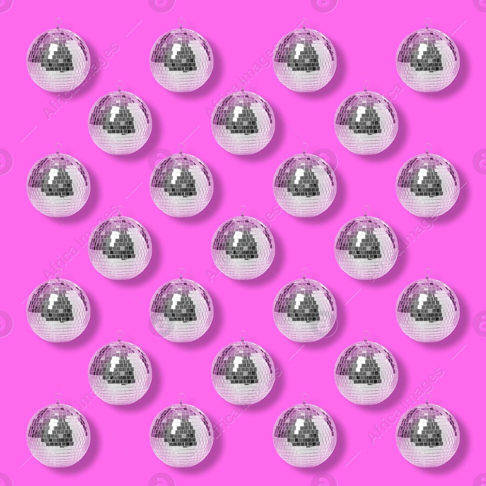 Image of Many shiny disco balls on pink background, flat lay