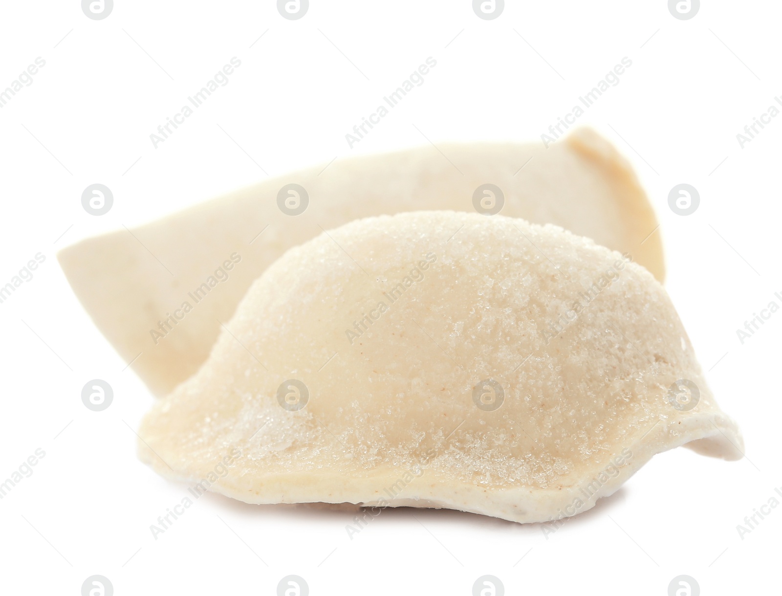 Photo of Raw dumplings with tasty filling on white background