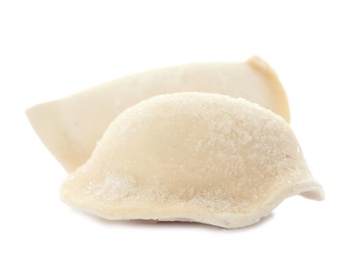 Raw dumplings with tasty filling on white background