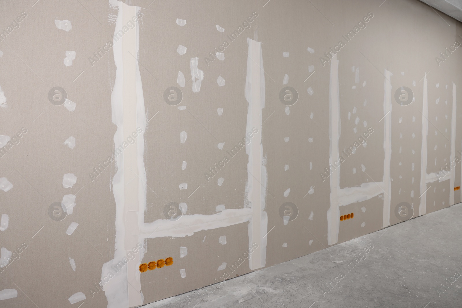 Photo of Wall with putty in room. Home renovation