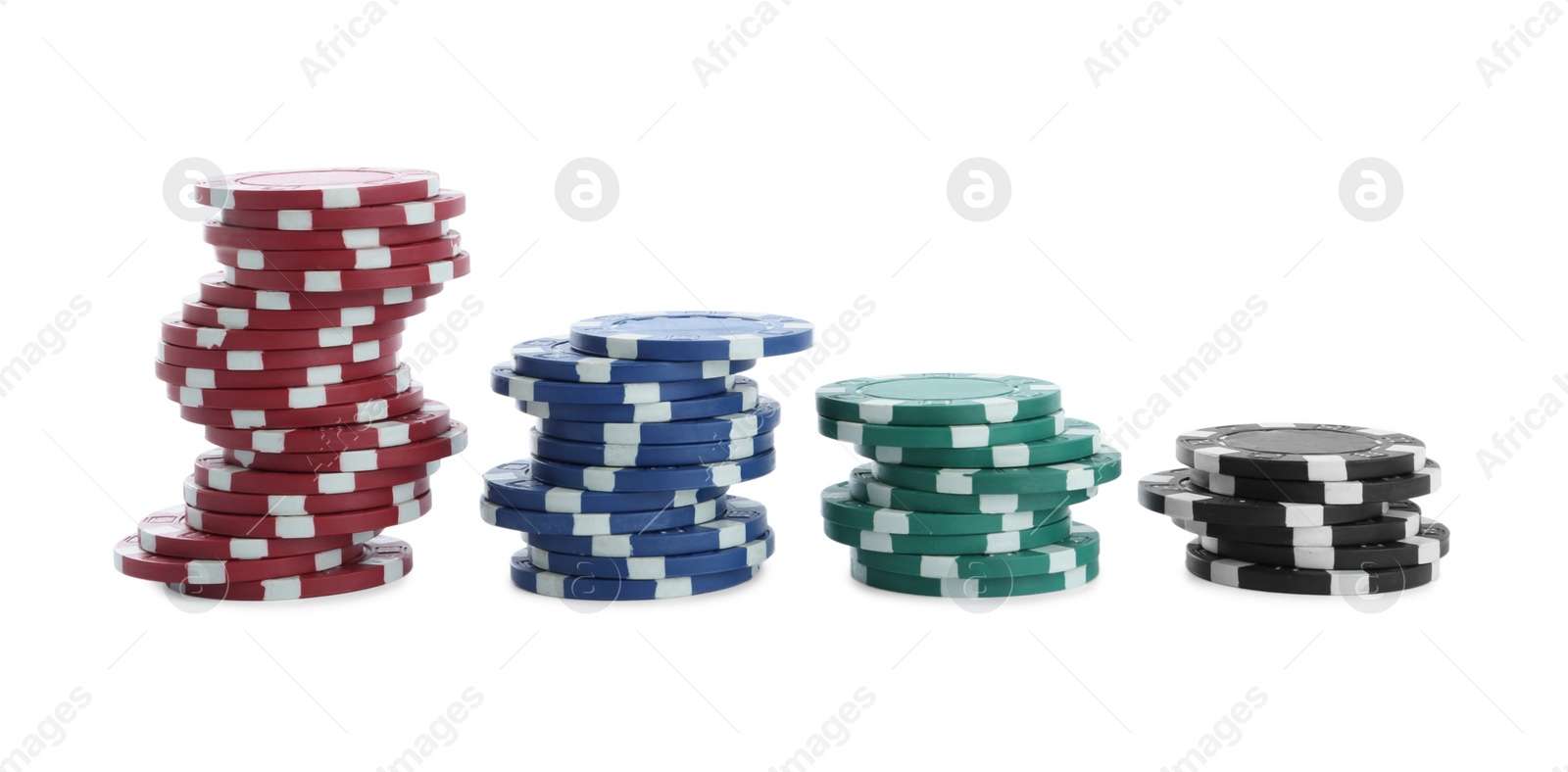 Photo of Stacks of casino poker chips on white background