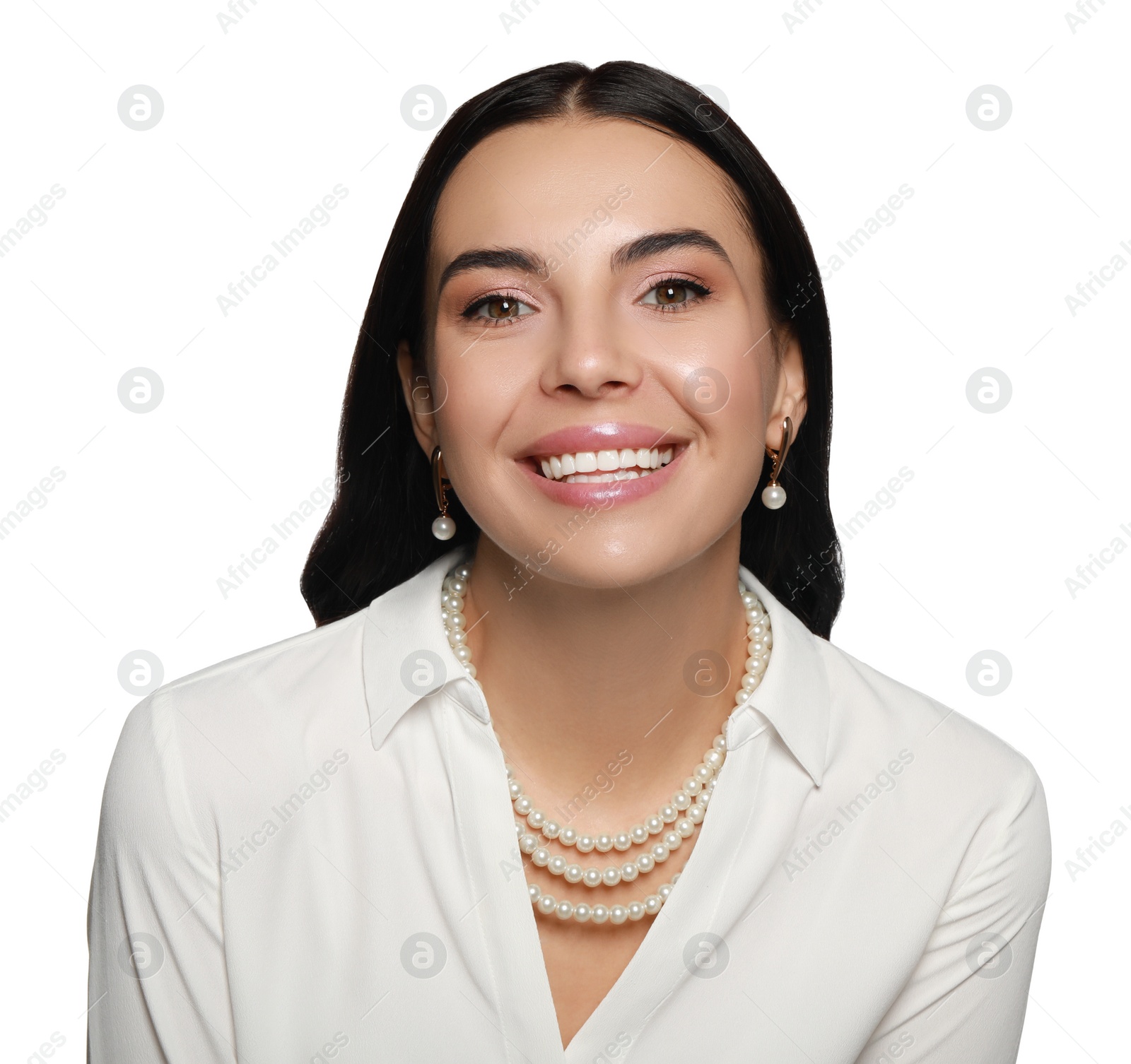 Photo of Young woman wearing elegant pearl jewelry on white background