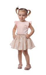 Little girl in cute clothes on white background