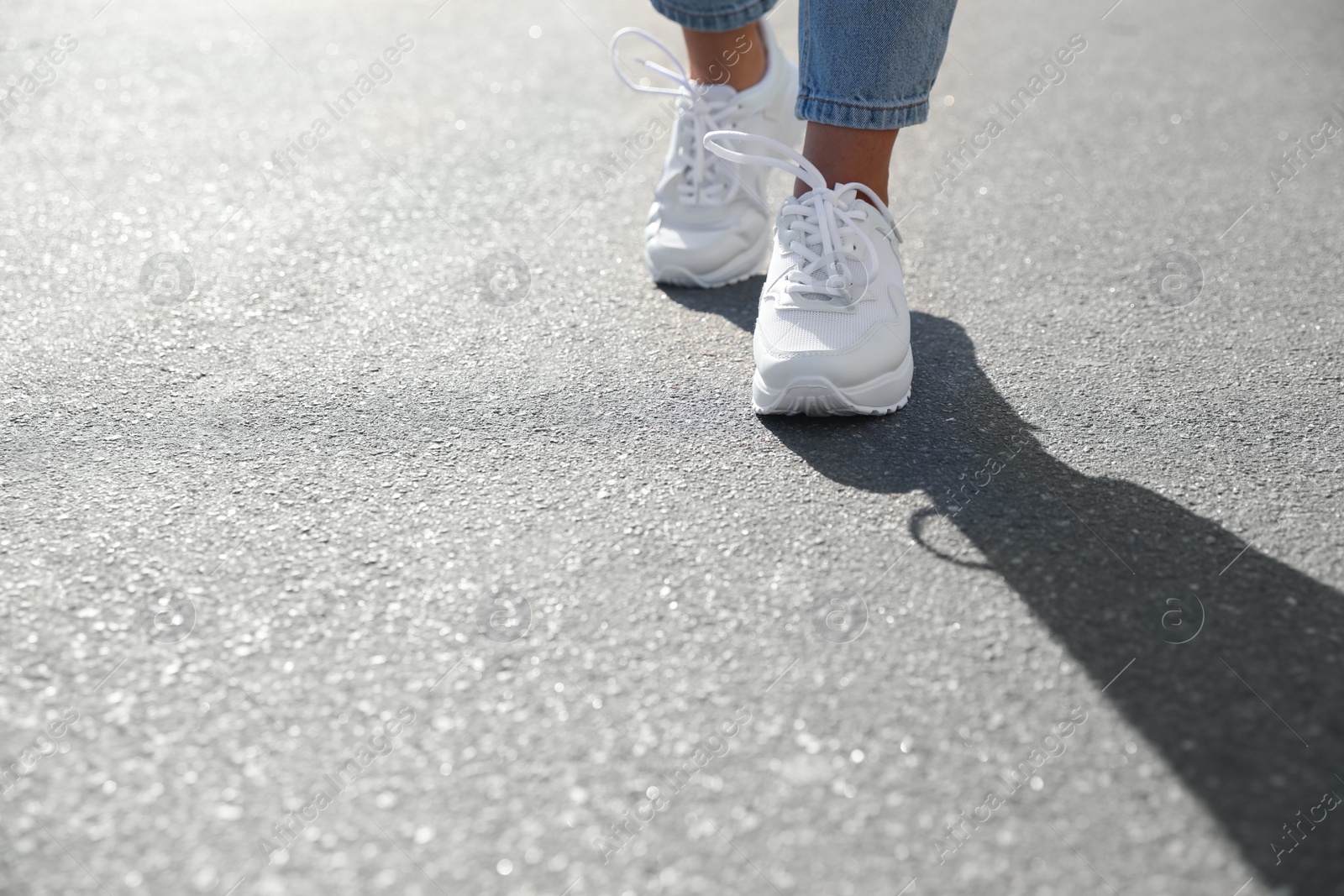 Photo of Woman walking outdoors, closeup with space for text. Choosing way concept.