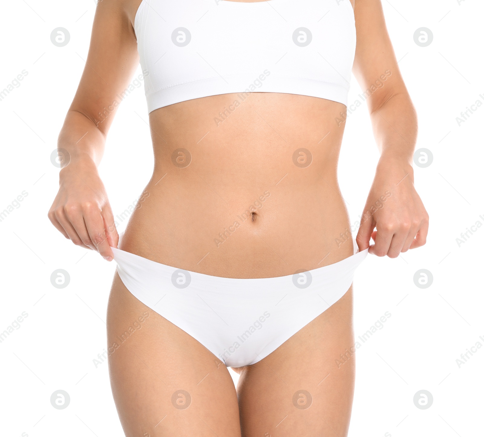 Photo of Slim young woman with smooth gentle skin on white background, closeup. Beauty and body care concept