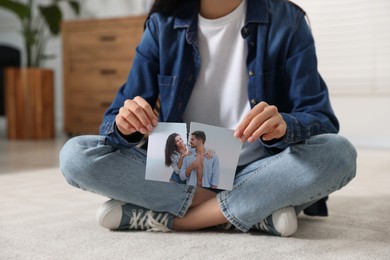 Photo of Woman ripping photo at home, closeup. Divorce concept