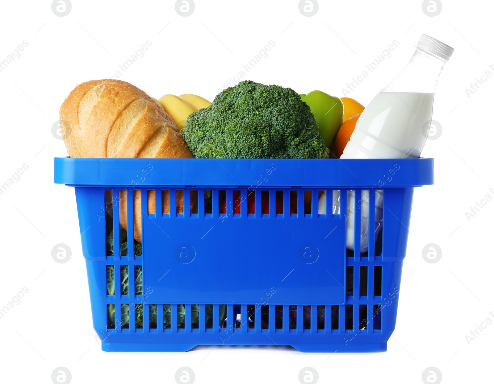 Photo of Shopping basket with grocery products on white background