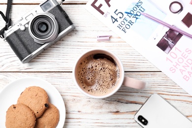 Photo of Creative flat lay composition with delicious hot coffee on table