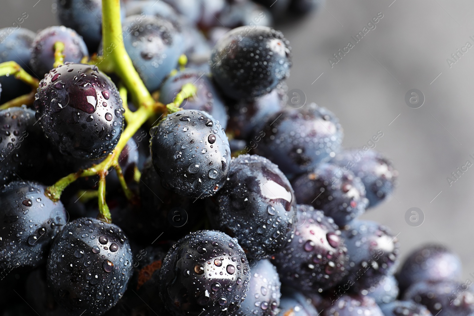 Photo of Bunch of fresh ripe juicy grapes as background, closeup