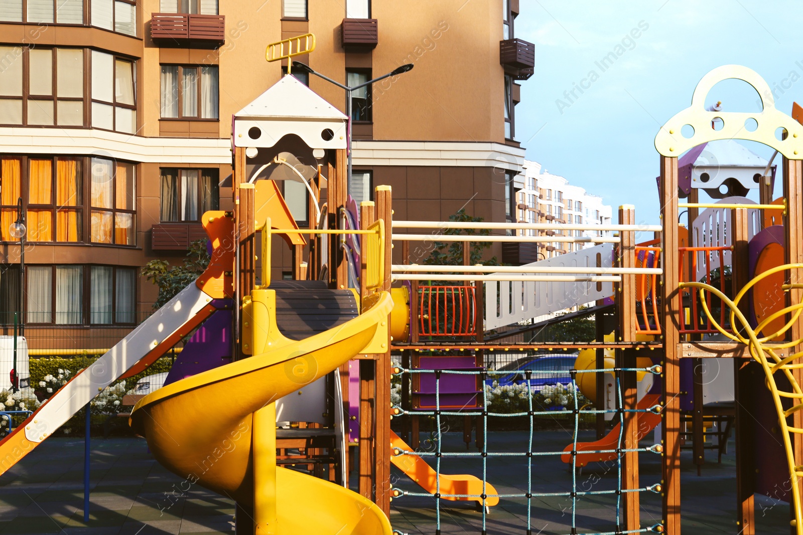 Photo of Colourful outdoor playground for children in residential area