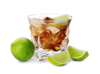Glass of refreshing drink with ice cubes and lime on white background