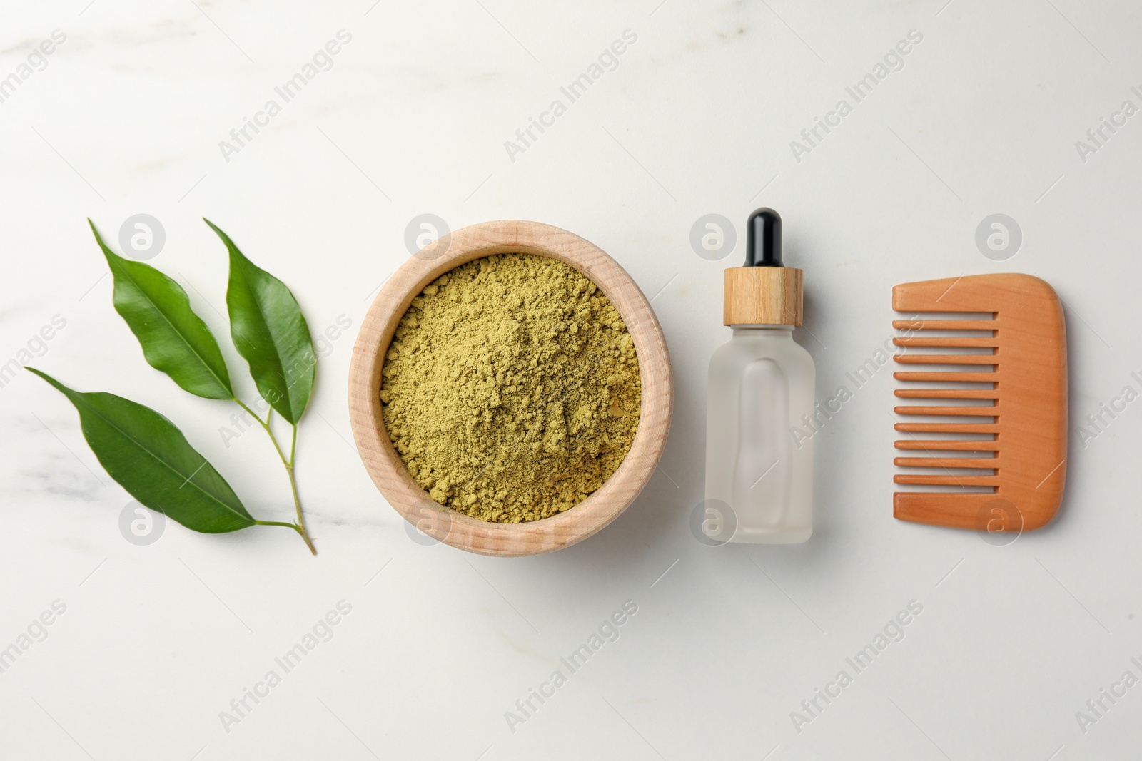 Photo of Flat lay composition with henna powder and comb on white marble table. Hair care products