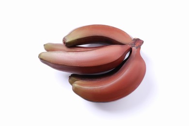 Photo of Tasty red baby bananas on white background, top view