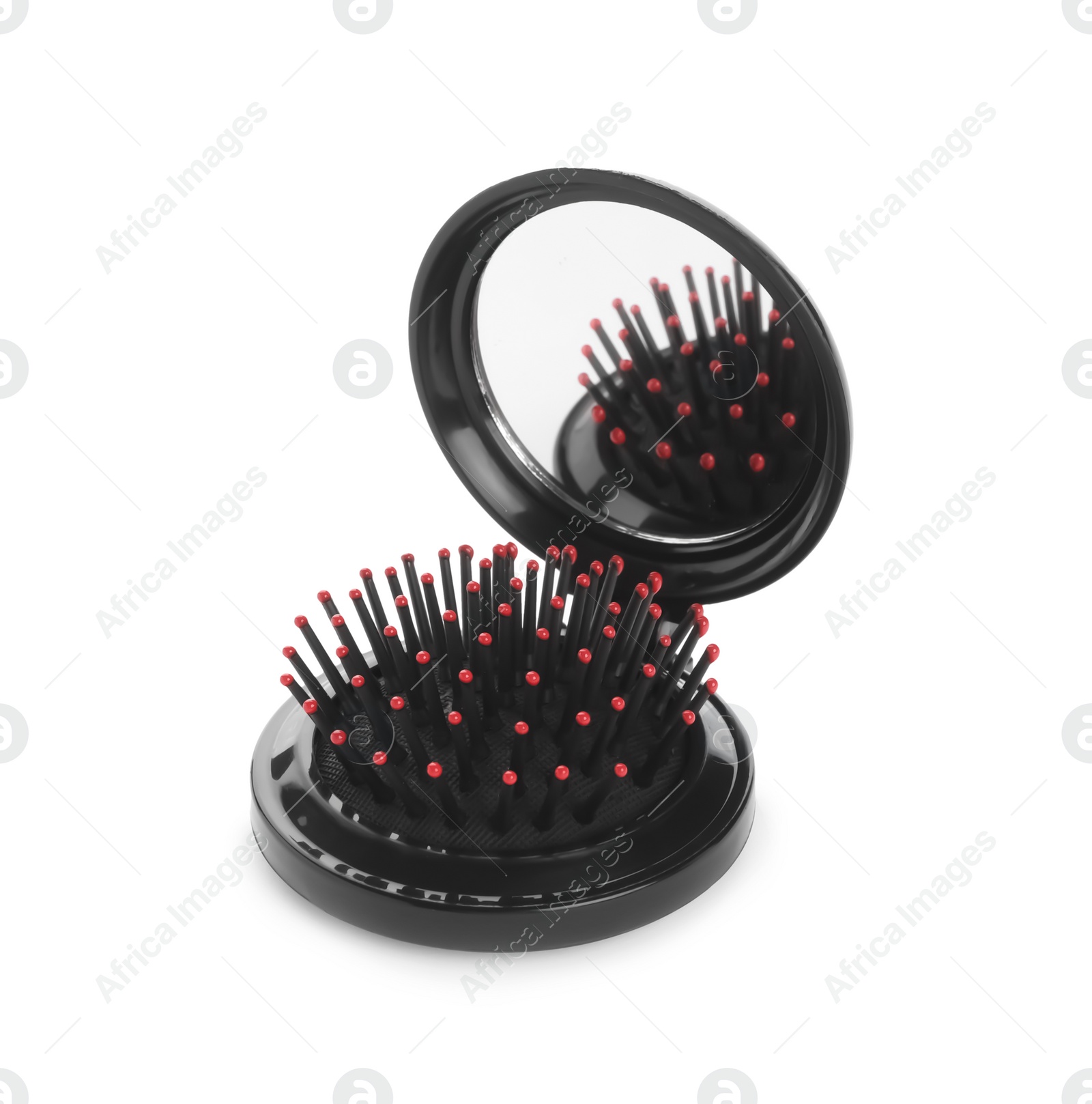 Photo of Round folding hair brush with mirror isolated on white