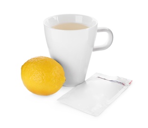 Photo of Cup of hot tea, lemon and cold remedy on white background