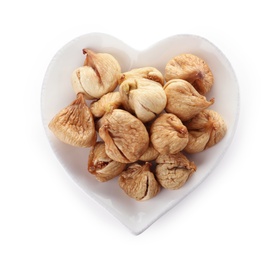 Photo of Heart shaped plate with figs on white background, top view. Dried fruit as healthy food