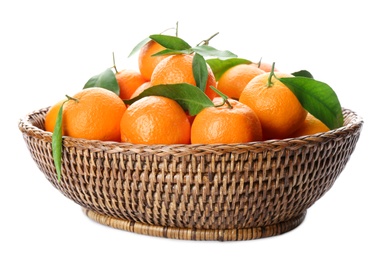 Photo of Fresh tangerines in wicker bowl on white background