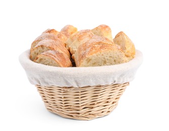 Photo of Cut delicious French baguette in wicker basket isolated on white