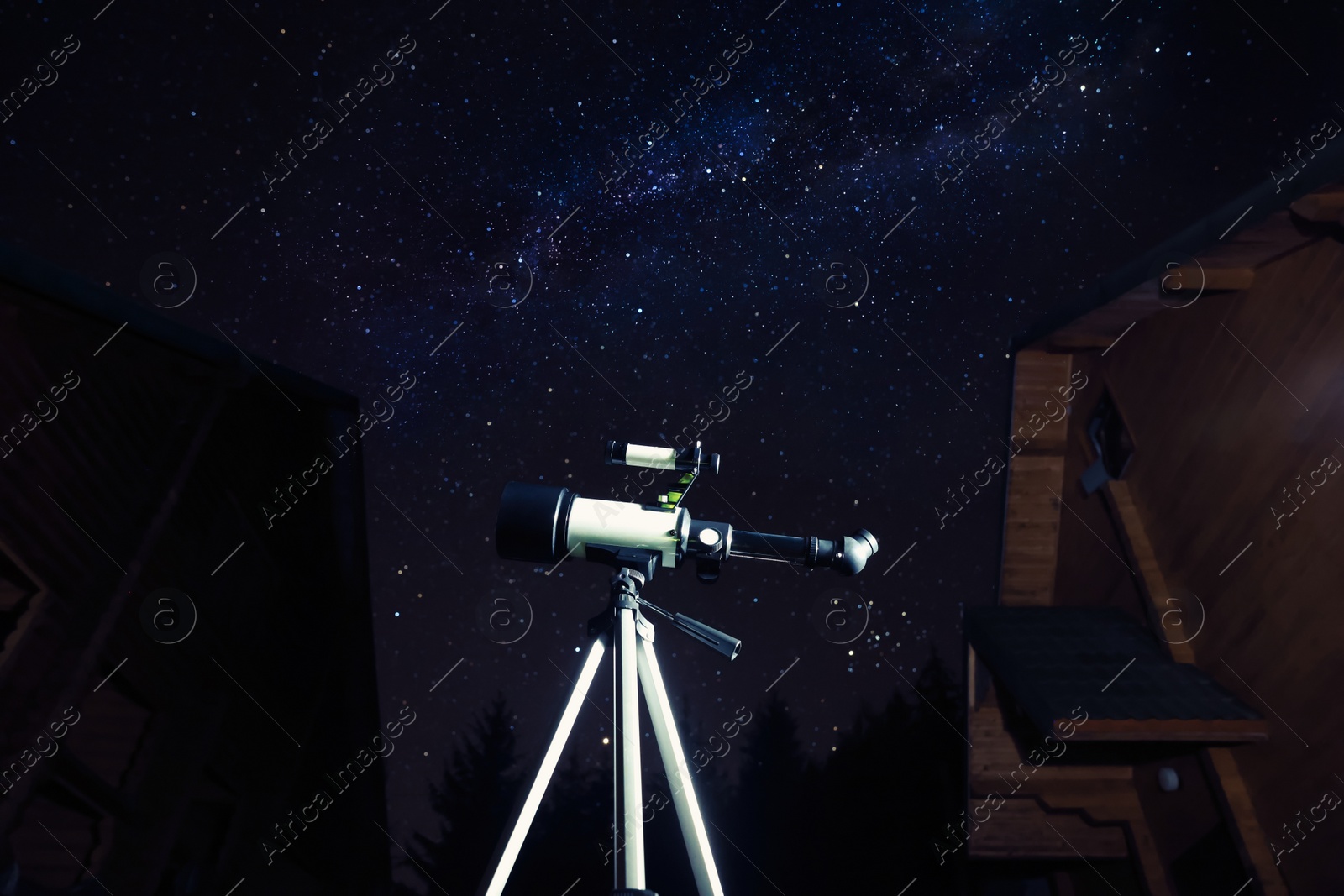 Photo of Modern telescope and beautiful sky in night outdoors, low angle view. Learning astronomy