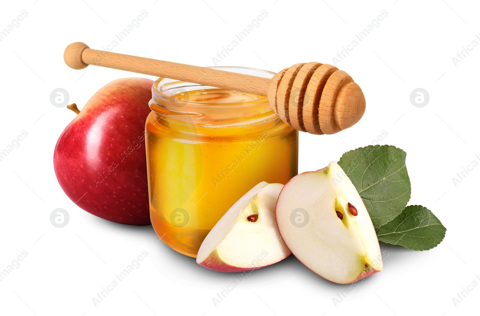 Image of Honey in glass jar, apples and dipper isolated on white