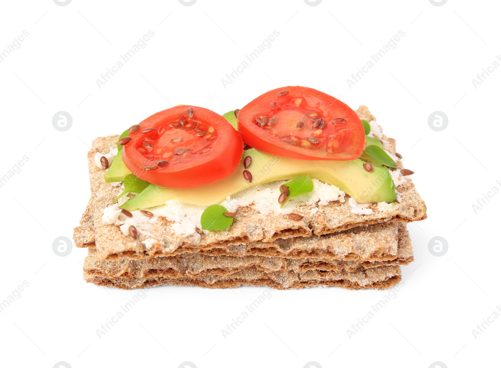 Photo of Fresh crunchy crispbreads with cream cheese, tomatoes and avocado on white background