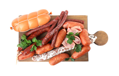 Photo of Wooden board with different tasty sausages isolated on white, top view