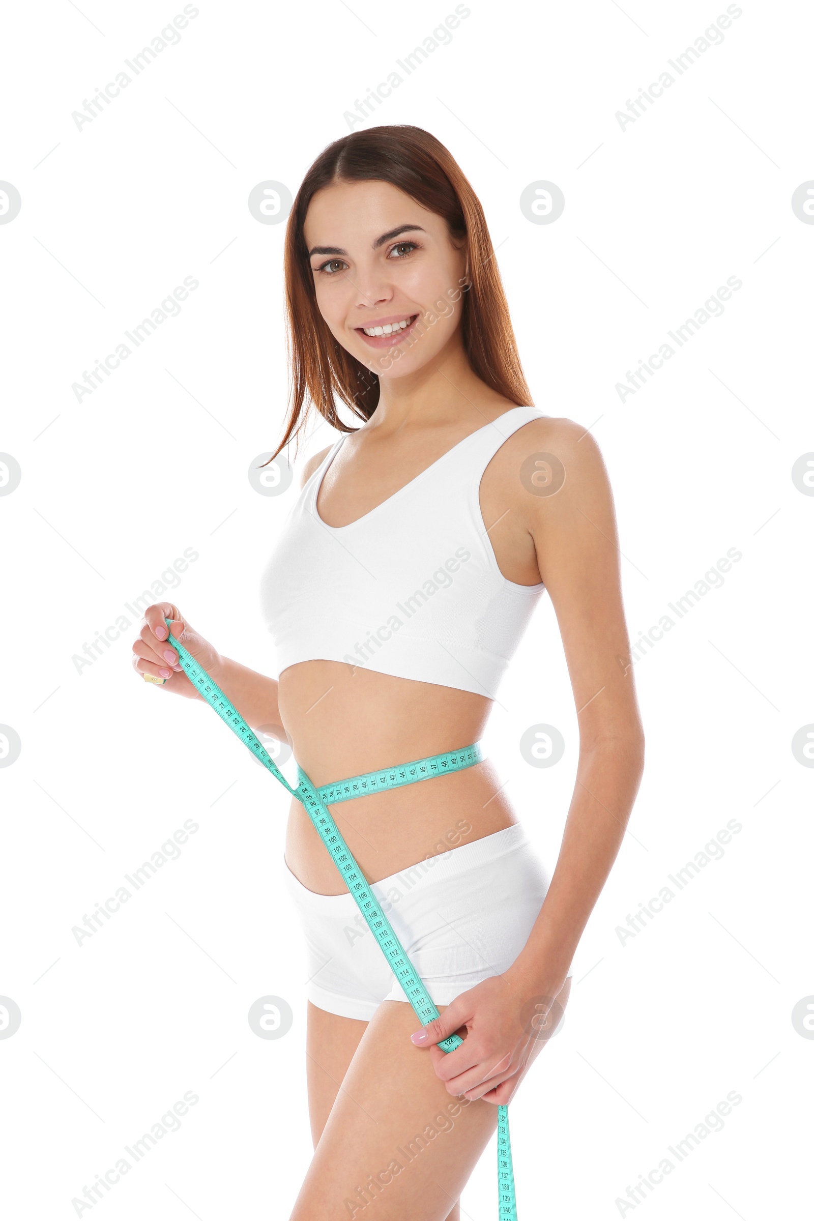 Photo of Slim woman measuring her waist on white background. Weight loss