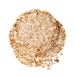 Photo of Stack of crunchy rice cakes isolated on white, top view