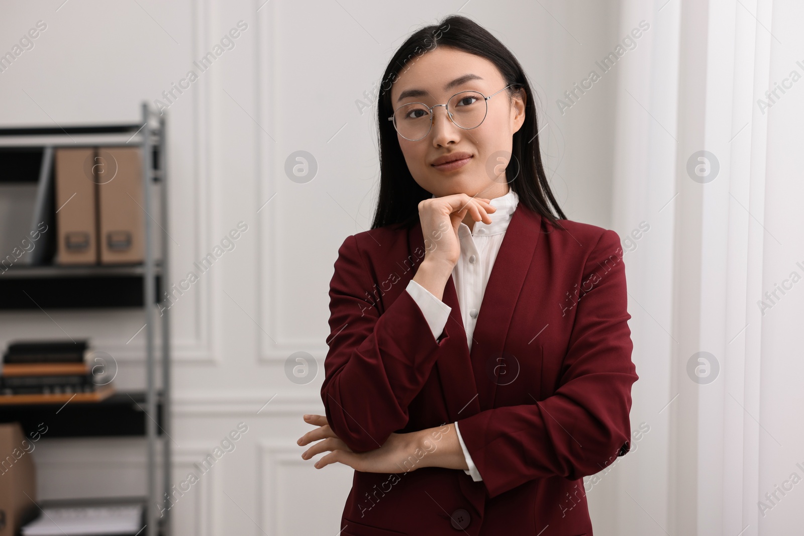 Photo of Portrait of happy notary in office. Space for text