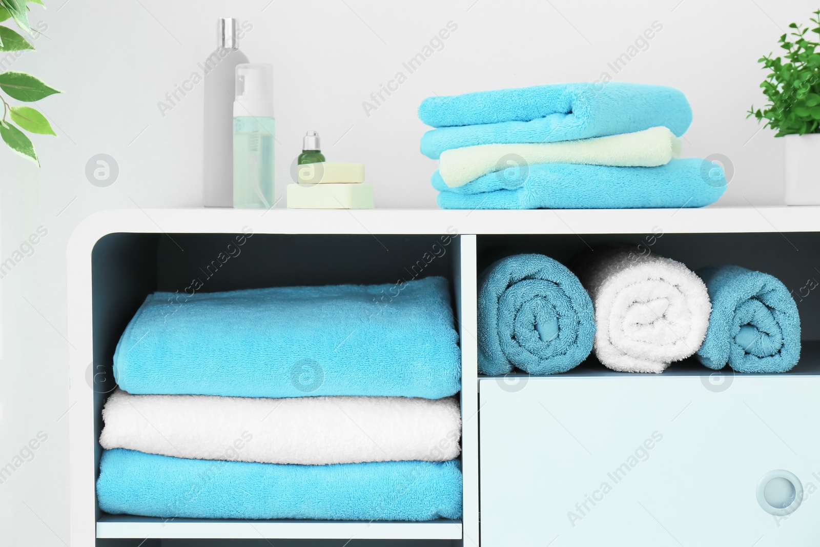 Photo of Many clean towels in bathroom