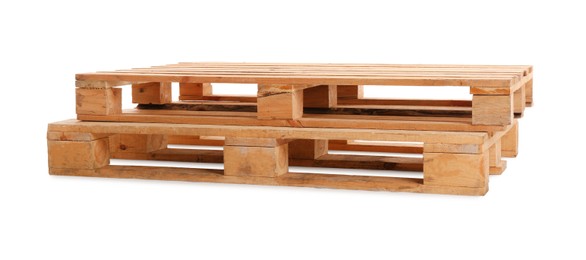 Photo of Wooden pallets isolated on white. Transportation and storage