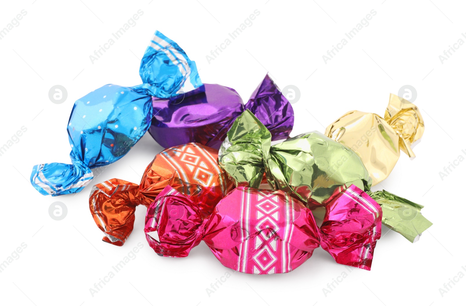 Photo of Sweet candies in colorful wrappers on white background