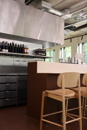 Photo of Modern cafe with stylish furniture. Interior design