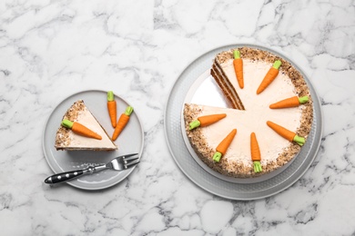 Photo of Flat lay composition with sweet carrot cake on white marble table
