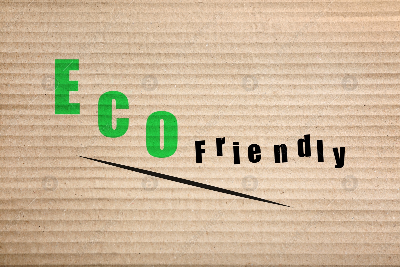 Image of Phrase Eco Friendly written on cardboard, top view