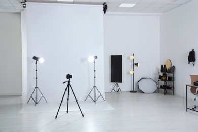 Photo of Photo studio interior with set of professional equipment