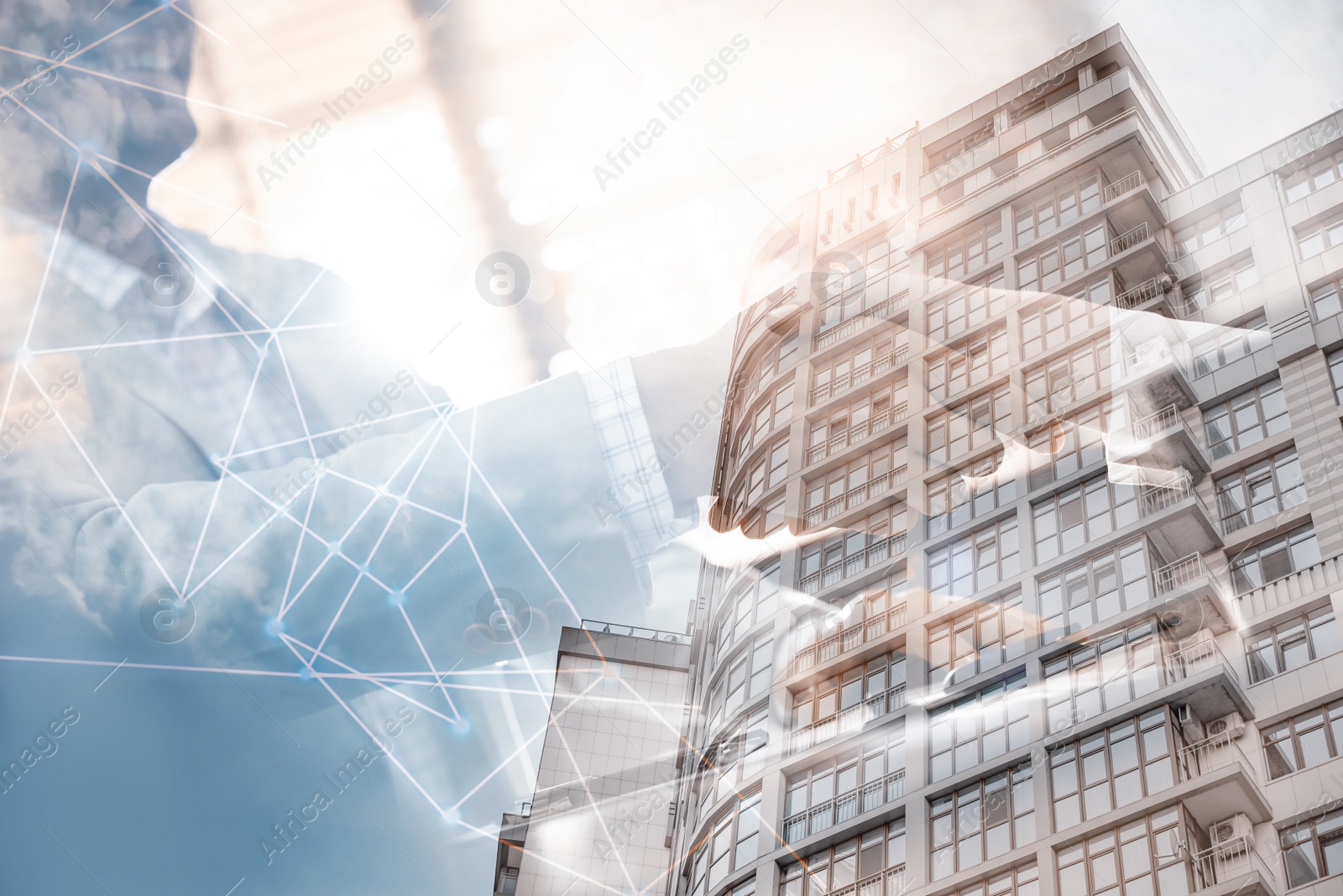 Image of Business people shaking hands and modern building, closeup. Double exposure 