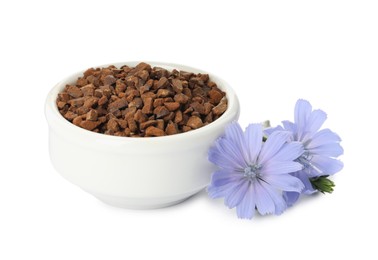 Photo of Bowl of chicory granules and flowers on white background