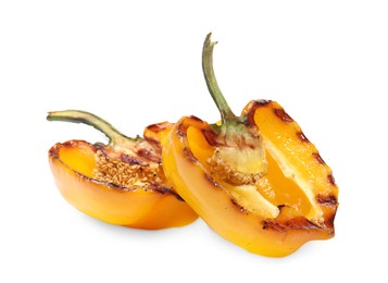 Photo of Halves of grilled yellow bell pepper isolated on white