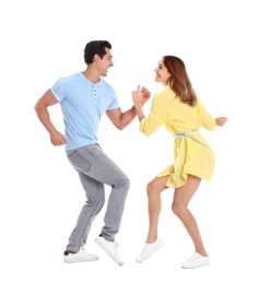 Photo of Beautiful young couple dancing on white background