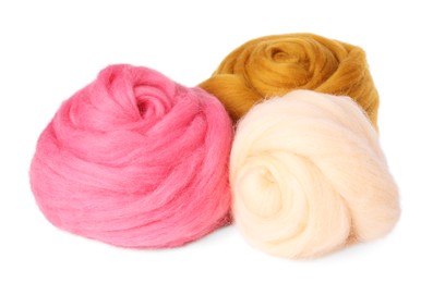 Photo of Beige, yellow and pink felting wool isolated on white