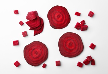 Photo of Cut fresh beet on light background, flat lay