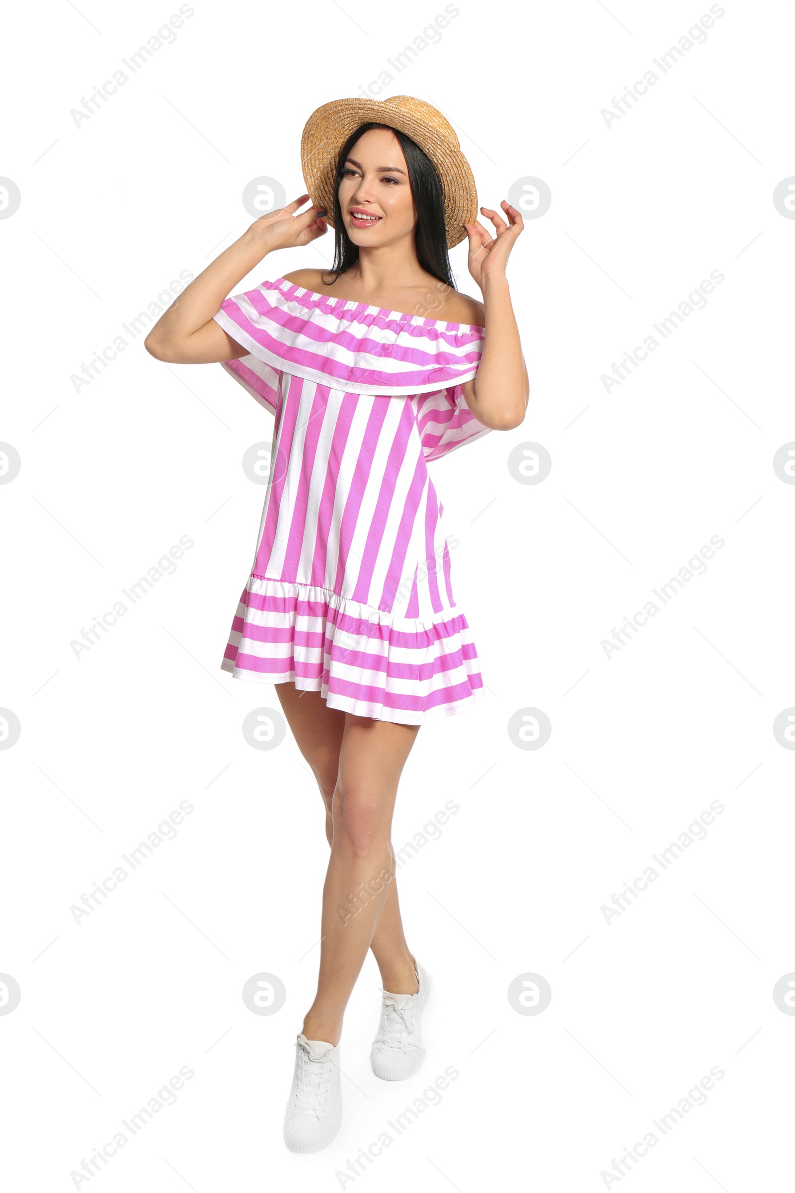 Photo of Beautiful woman in straw hat posing on white background