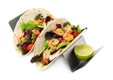 Photo of Delicious tacos with shrimps and lime on white background