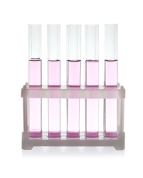 Photo of Test tubes with pink liquid on white background