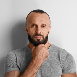 Photo of Portrait of handsome man on white background